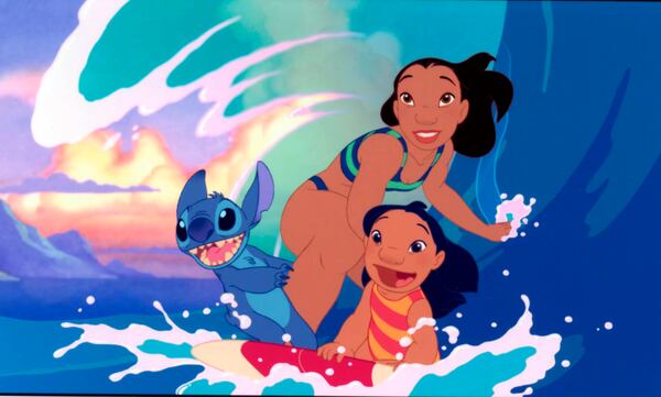 Lilo, Nani and Stitch surfing during the “Hawaiian Roller Coaster Ride” sequence from “Lilo & Stitch.” (Walt Disney Pictures/Entertainment Pictures/Zuma Press/TNS)