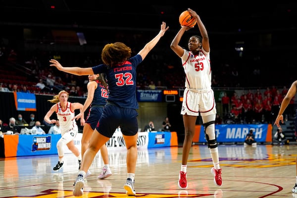 Georgia forward Jillian Hollingshead (53) shoots over Dayton forward Brynn Shoup-Hill (32) during the first half of a first round game in the NCAA women's college basketball tournament, Friday, March 18, 2022, in Ames, Iowa. (AP Photo/Charlie Neibergall)