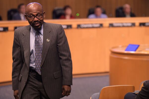 Gabe Okoye, chairman of the Gwinnett County Democratic Party, walks away from the podium after telling the Gwinnett Board of Commissioners that the election to determine the approval of a new contract with MARTA should be held in the upcoming November election instead of being delayed until 2019 on Wednesday, August 1 at the Gwinnett Justice and Administration Center auditorium. JENNA EASON / JENNA.EASON@COXINC.COM