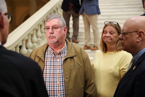 Richard Aspinwall speaks to members of the new media after Georgia House Speaker Jon Burns announced school safety legislation on Monday, Feb. 3, 2025, at the Capitol in Atlanta. Richard and his wife, Rita, are parents of one Ricky Aspinwall, a teacher and an assistant football coach at the school killed in a shooting at Apalachee High School in Winder last year.