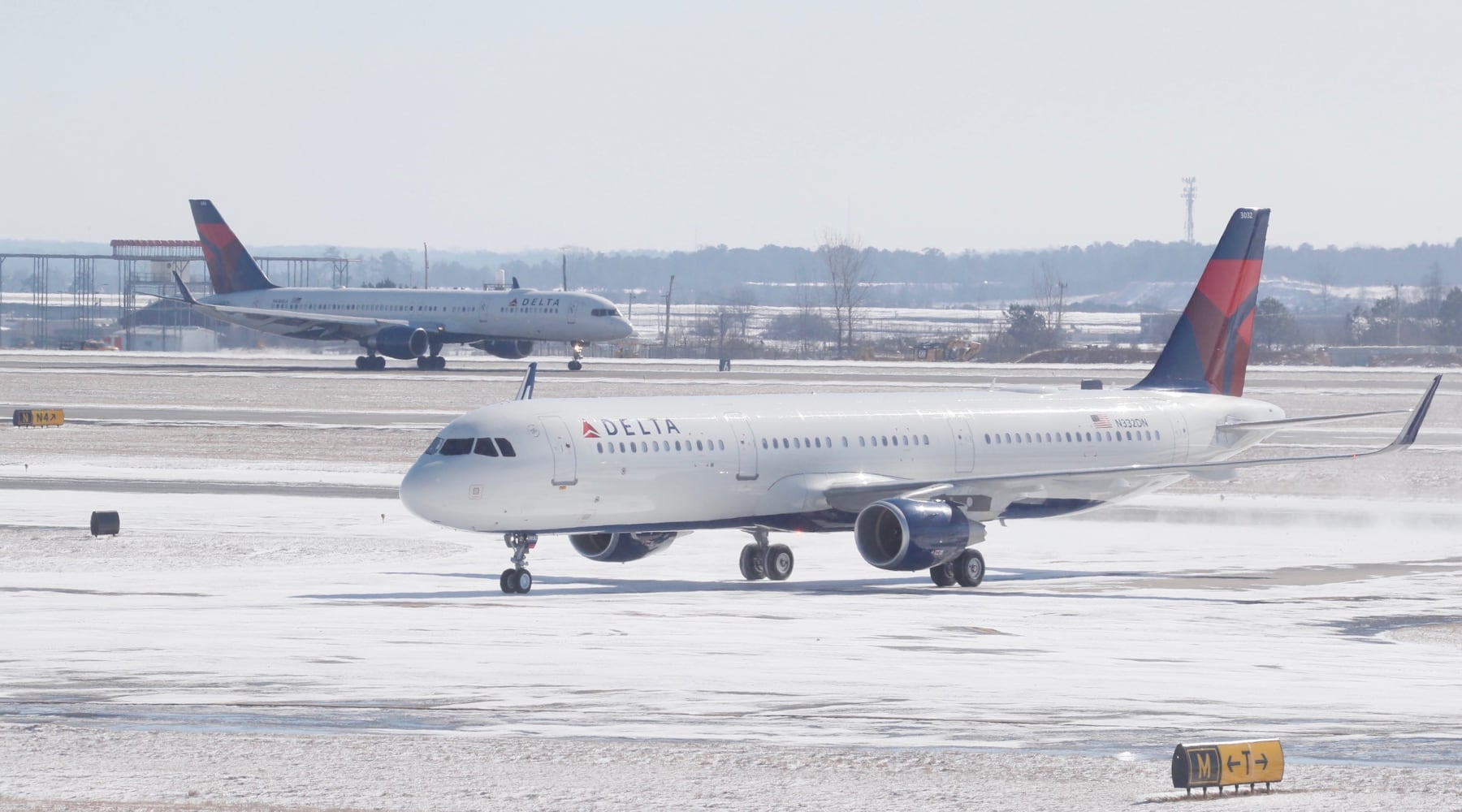 Photos: Frigid cold and snow move in to metro Atlanta