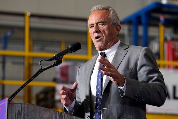 FILE - Robert F. Kennedy, Jr., speaks before Republican presidential nominee former President Donald Trump at a campaign event, Sept. 27, 2024 in Walker, Mich. (AP Photo/Carlos Osorio)