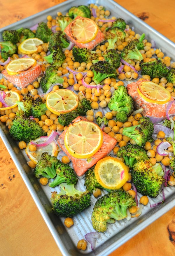 Broccoli, Salmon, Chickpea and Red Onion Sheet-pan Bake is a great option on a busy weeknight. STYLING BY JENNIFER ZYMAN / CONTRIBUTED BY CHRIS HUNT PHOTOGRAPHY