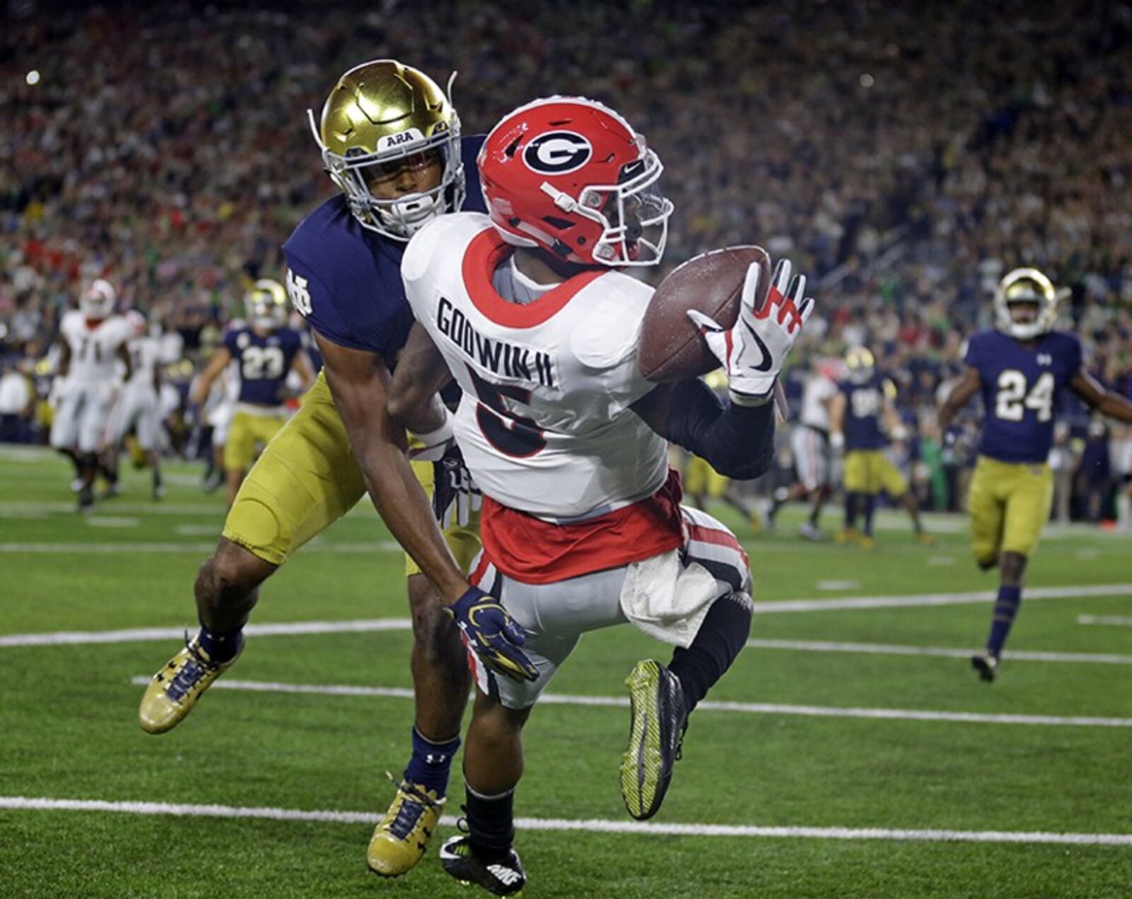 Former Callaway player Terry Godwin just finished up a college career that included an MVP trophy of the TaxsSlayer Bowl against Penn State in 2016 and this iconic one-handed touchdown catch against Notre Dame in 2017. 