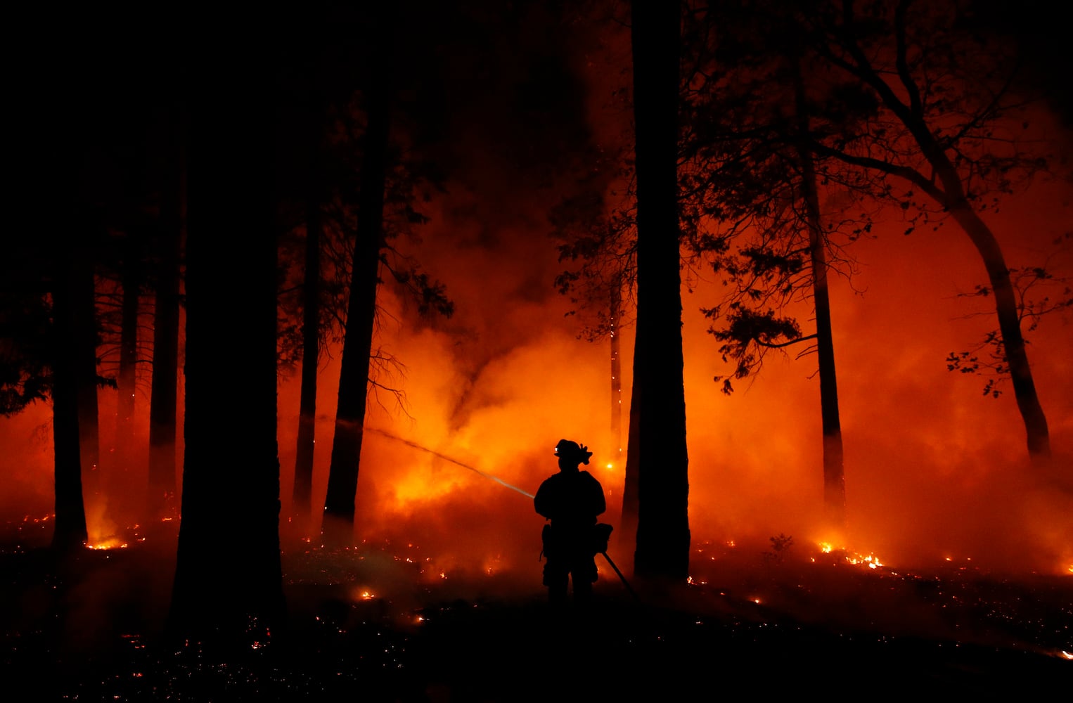 Photos: Deadly wildfires blaze through northern, southern California