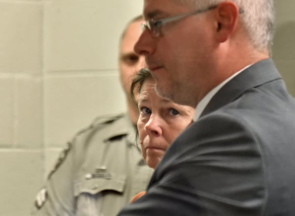 June 21, 2019 Canton - Melody Farris appears with her attorney Michael Ray (foreground) for first appearance before Chief Judge James Drane at Cherokee County Magistrate Court in Cherokee County Detention Center in Canton on Friday, June 21, 2019.  She is accused of killing her husband, attorney Gary Farris. . HYOSUB SHIN / HSHIN@AJC.COM