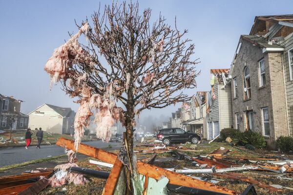 The damage on Jumpers Trail in the Chestnut Ridge subdivision in South Fulton. While there were no reports of injuries, the storm ripped roofs off houses, knocked homes off their foundations and damaged cars. JOHN SPINK/JSPINK@AJC.COM