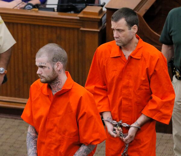 6/21/17 - Eatonton, GA - Ricky Dubose (front) and Donnie Russsell Rowe enter the Putnam County courthouse on Wednesday, June 21.  Ricky Dubose and Donnie Russell Rowe,  captured fugitives accused of killing two prison guards, had their first appearance in Putnam County Court this morning.   District Attorney Stephen Bradley says he will seek the death penalty against a pair of Georgia fugitives who led authorities in a three-day manhunt after killing two prison guards.   BOB ANDRES  /BANDRES@AJC.COM