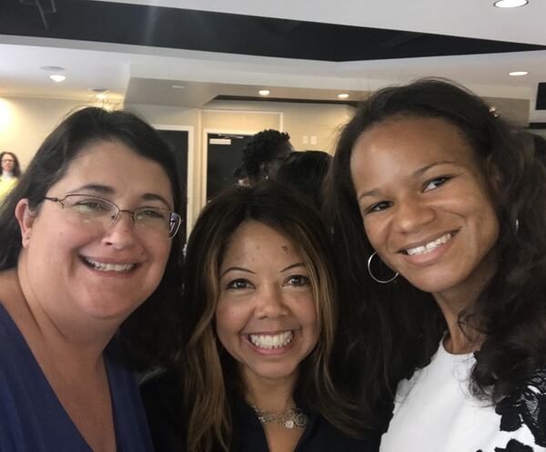 Adrienne White (right), along with State Sen. Zahra Karinshak and Congresswoman Lucy McBath at a 2017 training session for Democratic candidates. Special to the AJC