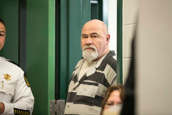 Frankie Gebhardt enters a courtroom before the start of a preliminary hearing inside the Spalding County law enforcement complex, Thursday, November 30, 2017. Gebhardt and Bill Moore Sr. are accused of killing Timothy Coggins in 1983. Coggins, who was 23-years-old when the murder occurred, was allegedly killed for socializing with a white woman. 