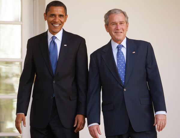 FILE - President-elect Obama and President Bush stand together on the West Wing Colonnade of the White House in Washington, Monday, Nov. 10, 2008. (AP Photo/Charles Dharapak, File)