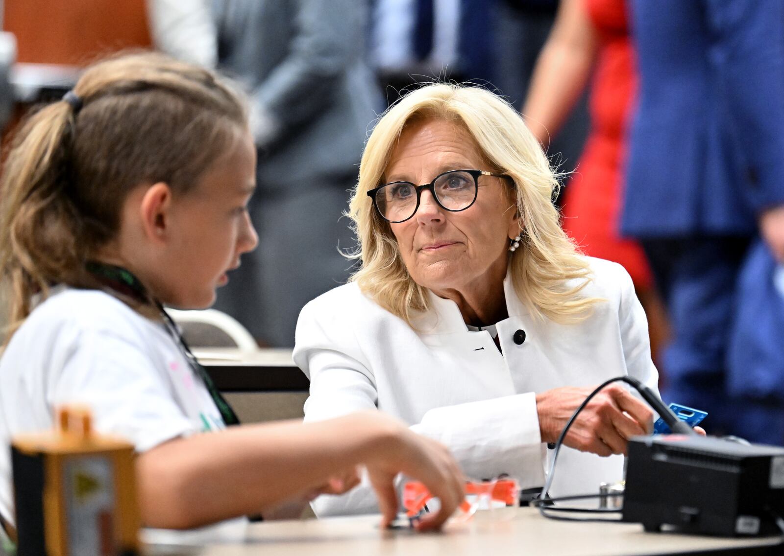 First lady Jill Biden is headed to Atlanta on Thursday for a fundraiser hosted by Comer and Sally Quillian Yates. She is pictured with a student at Cougar Manufacturing Camp, where students age 12-14 learn about virtual reality and STEM activities, during America Workforce Hub tour at Augusta Technical College, Tuesday, July 18, 2023, in Augusta, Georgia. (Hyosub Shin/hyosub.shin@ajc.com)