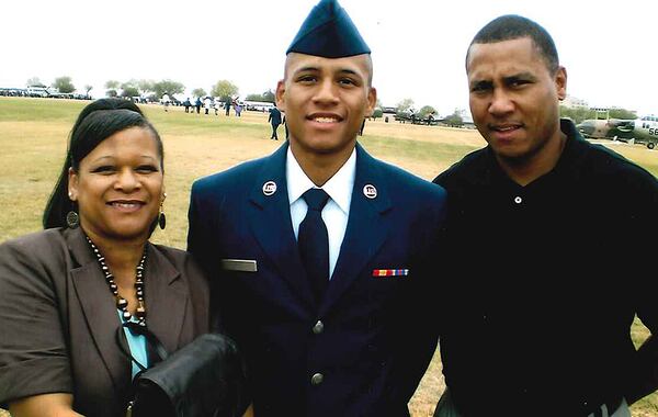 Anthony Hill and his parents - Anthony Hill Sr. and Carolyn Baylor-Giummo