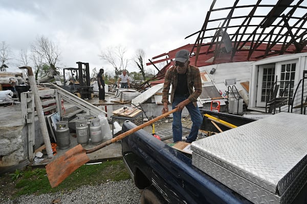 March 27, 2021 Newnan - Workers clean up destructed store at Mr. Carpet on Spence Avenue in the aftermath of the tornado that tore through the Newnan on Saturday, March 27, 2021. Storms that rolled through North Georgia late Thursday into Friday left a path of destruction, killing one person and injuring others. Most of metro Atlanta was spared from major damage, but Bartow and Polk counties - in northwest Georgia - and Coweta County south of Atlanta took the brunt of the impact. Late Friday, the National Weather Service said it was an EF4 tornado with 170-mph winds that hit Coweta. (Hyosub Shin / Hyosub.Shin@ajc.com)