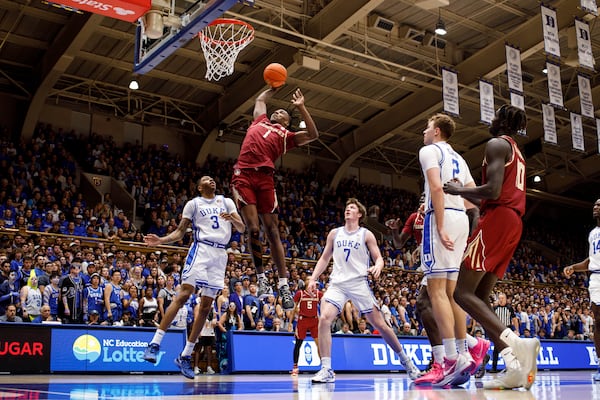 Florida State's Jamir Watkins (1) dunks during the first half of an NCAA college basketball game against Duke in Durham, N.C., Saturday, Mar. 1, 2025. (AP Photo/Ben McKeown)