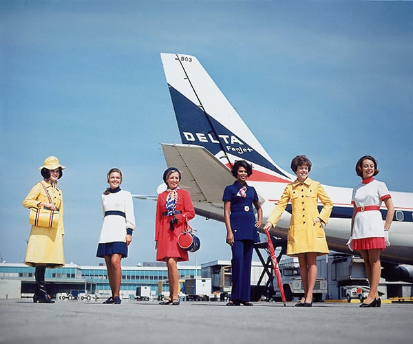 The 1970s brought about significant changes in Delta's flight attendant uniforms - pants. Also, hats were no longer required. (Delta Flight Museum)