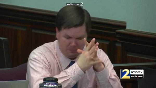 Justin Ross Harris reacts to hearing his brother Michael Baygents testify about a trip that their families took together, during Harris' murder trial at the Glynn County Courthouse in Brunswick, Ga., on Tuesday, Nov. 1, 2016. (screen capture via WSB-TV)