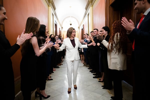 House Speaker Nancy Pelosi, D-Calif., is greeted by staff after she announced that she would step down from her leadership position, on Capitol Hill in Washington on Thursday, Nov. 17, 2022. (Erin Schaff/The New York Times)