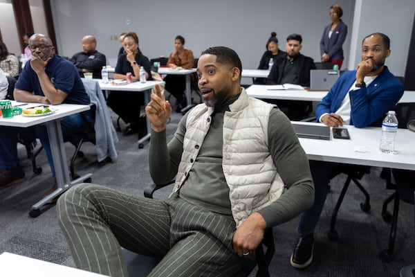 Daryl James, founder and owner of EME Construction, asks a question at a clinic for construction businesses that is being run by the Morehouse Innovation and Entrepreneurship Center at McCarthy Building Companies in Atlanta on Tuesday, February 20, 2024. (Arvin Temkar / arvin.temkar@ajc.com)