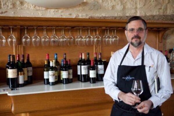 Michael Bishop in 2010 tasting 2009 Bordeaux barrel samples at Château d'Angludet. (Courtesy of Michael Bishop)