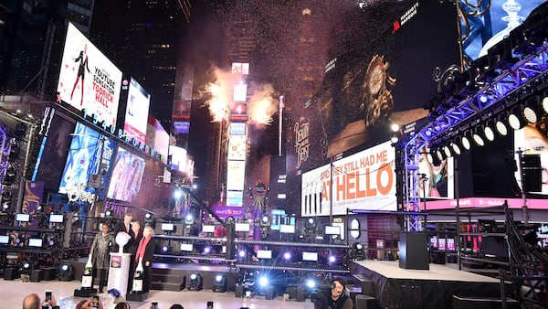 FILE PHOTO: A view of the ball dropping during New Year's Eve 2017 in Times Square at Times Square on December 31, 2016 in New York City.  (Photo by Theo Wargo/Getty Images)