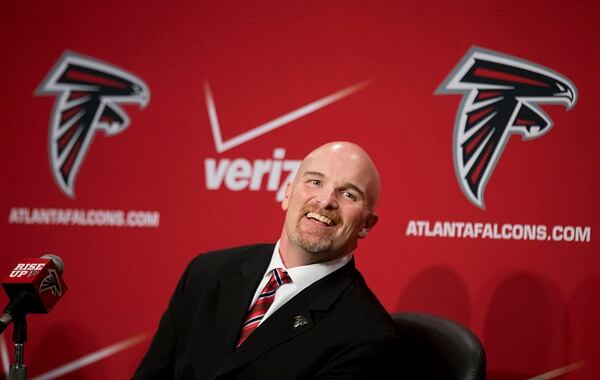 FILE - In this Feb. 3, 2015, file photo, Dan Quinn smiles as a reporter asks a question during a news conference introducing him as the new head coach of the Atlanta Falcons NFL football team in Flowery Branch, Ga. Dan Quinn isn't just getting to know his players. Quinn is also learning what it means to be an NFL head coach for the first time as the Atlanta Falcons begin offseason workouts. (AP Photo/John Bazemore, File) Dan Quinn should be a happy man, given that schedule. (John Bazemore/AP Photo)