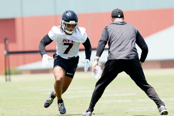 Atlanta Falcons running back Bijan Robinson (7) runs a drill during OTAs at the Atlanta Falcons Training Camp, Wednesday, June 7, 2023, in Flowery Branch, Ga. 
 Miguel Martinez / miguel.martinezjimenez@ajc.com