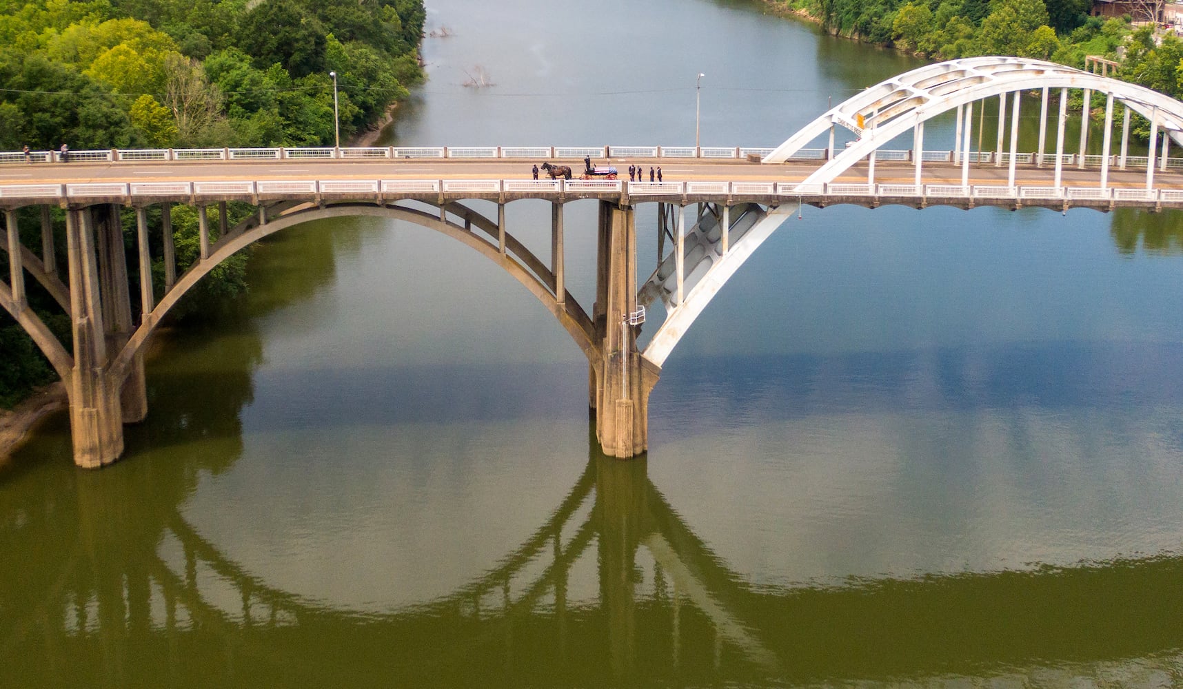 John Lewis crosses Edmund Pettus Bridge for final time