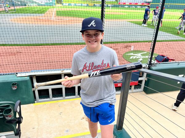 Ryan Patrick was given Austin Riley's bat, delivered by the Braves third baseman, during spring training in North Port, Fla. on Monday, Feb. 19, 2024.