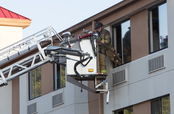 The fire broke out early Monday morning on the third floor of the Red Roof Inn on Fairington Road, DeKalb County fire officials said.