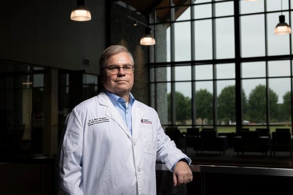 Environmental portrait of S. Mark Tompkins, UGA Athletic Association Distinguished Professor in Virology and Immunology and Director of the Center for Vaccines and Immunology inside the Small Animal Teaching Hospital.