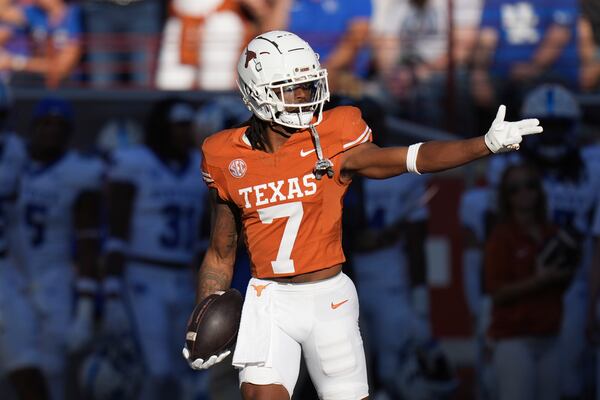 Texas wide receiver Isaiah Bond (7) celebrates a catch against Kentucky during the first half of an NCAA college football game in Austin, Texas, Saturday, Nov. 23, 2024. (AP Photo/Eric Gay)