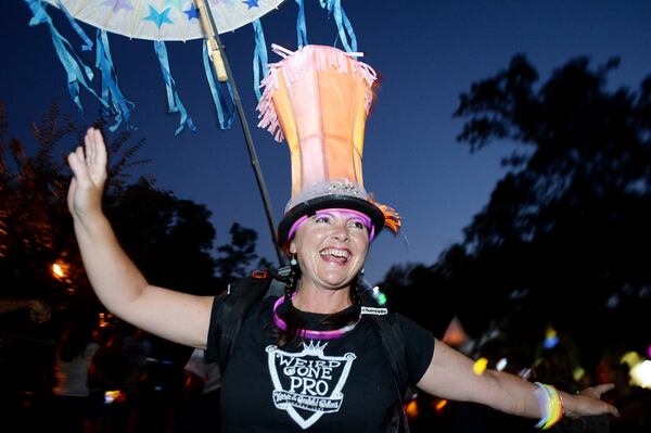 Chantelle Rytter, founder and organizer of the Atlanta Beltline Lantern Parade, leads the parade last year. HYOSUB SHIN / HSHIN@AJC.COM