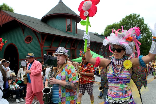 Feed & Seed Marching Abominable Band members make their way past the Trolley Barn during the parade.