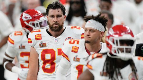 Kansas City Chiefs tight end Travis Kelce (87) quarterback Patrick Mahomes (15) and running back Kareem Hunt (29) walk off the field at the halftime break during the NFL Super Bowl 59 football game against the Philadelphia Eagles, Sunday, Feb. 9, 2025, in New Orleans. (AP Photo/Stephanie Scarbrough)