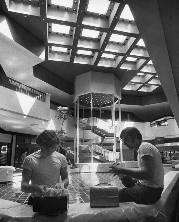 Workers on July 29, 1971, on a lunch break during the construction of Perimeter Mall, in DeKalb County, as it nears its opening.