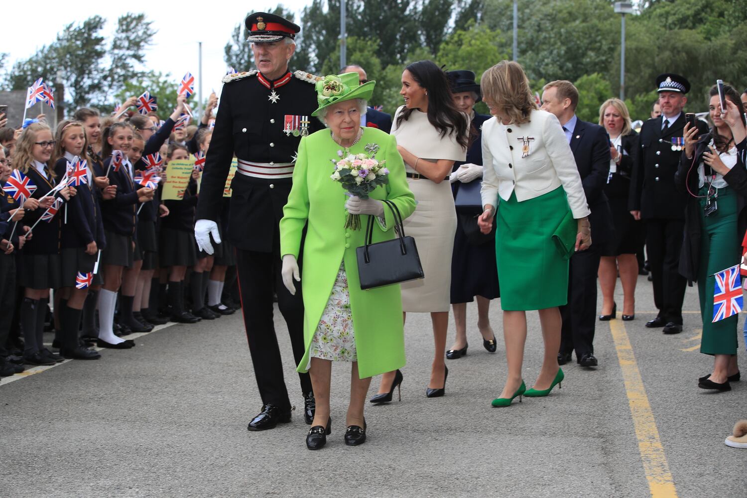 Photos: Meghan Markle stuns at first solo outing with Queen Elizabeth