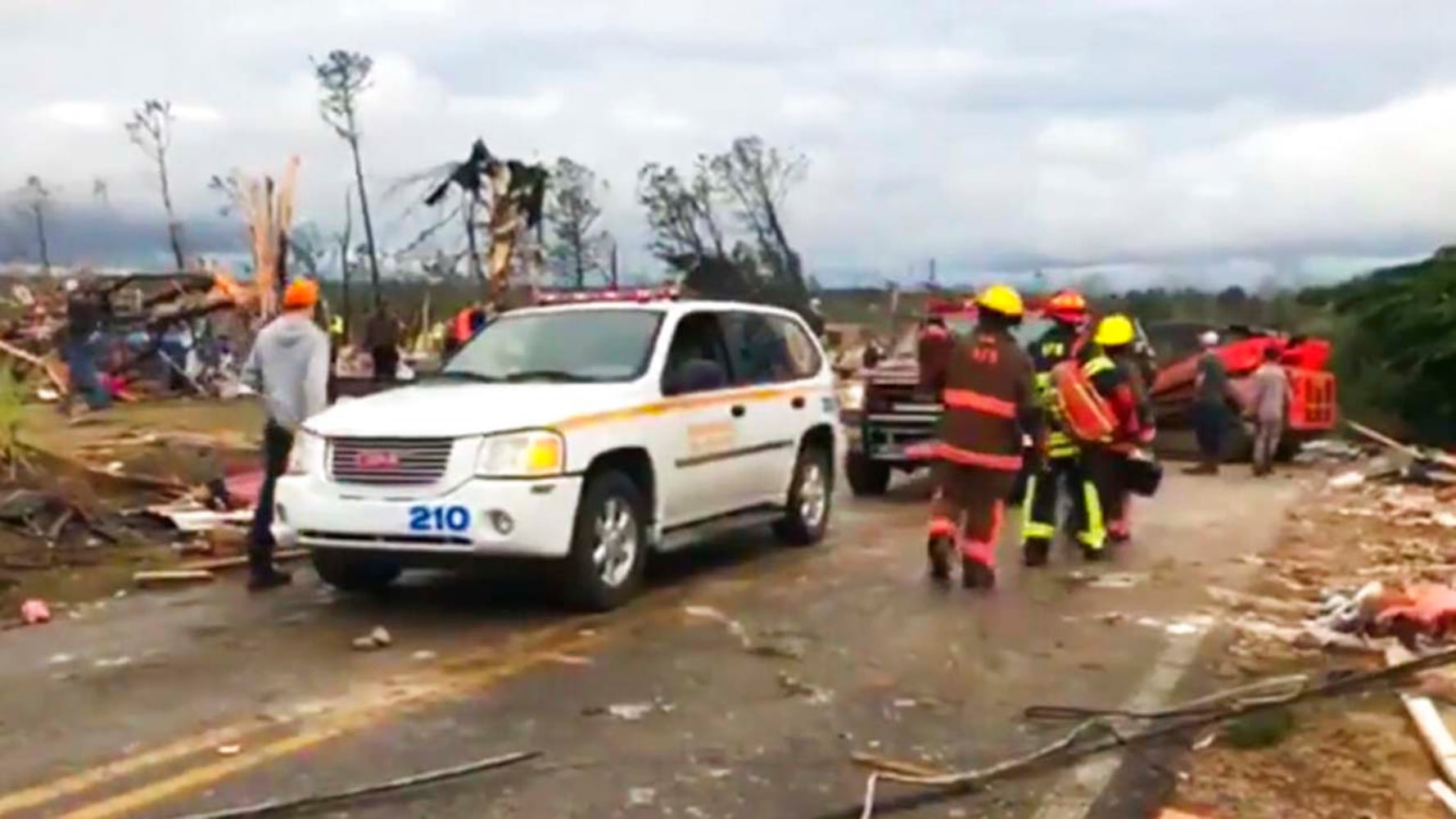 Photos: Possible tornadoes leave path of death, destruction in parts of Southeast