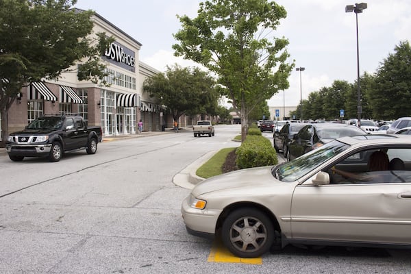 The street in front of DSW Shoes near Camp Creek Marketplace. The shopping center’s location makes it a popular pass-through for travelers, such as those heading to or from the airport. (Jenna Eason / Jenna.Eason@coxinc.com)