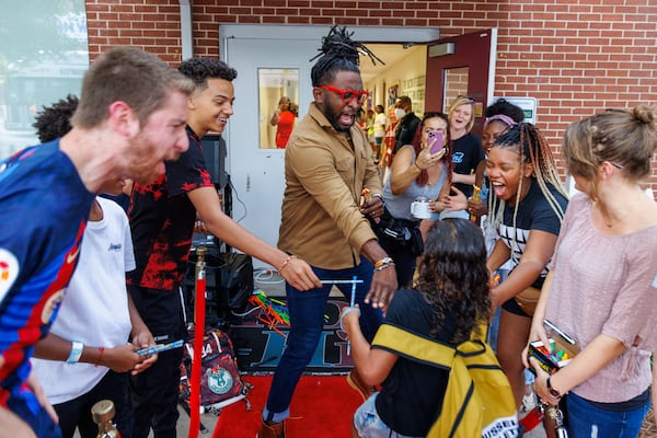 Students arrive for the first day of school at Hope-Hill Elementary School in Atlanta on Monday, August 1, 2022. (Arvin Temkar / arvin.temkar@ajc.com)