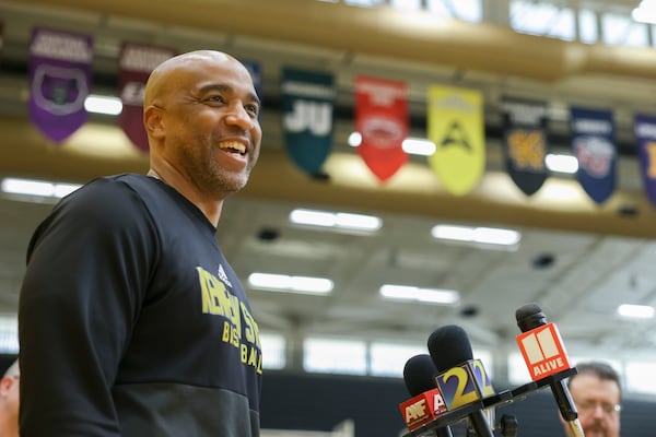 Kennesaw State University men’s basketball coach Amir Abdur-Rahim spoke with reporters at the Convocation Center Wednesday. His team has earned its first-ever trip to the NCAA Division I Tournament. Jason Getz / Jason.Getz@ajc.com)
