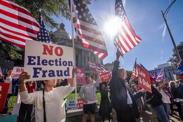 Supporters of then-President Donald Trump demonstrate against the election results in November 2020 in front of the state Capitol. (Photo: Steve Schaefer for The Atlanta Journal-Constitution)