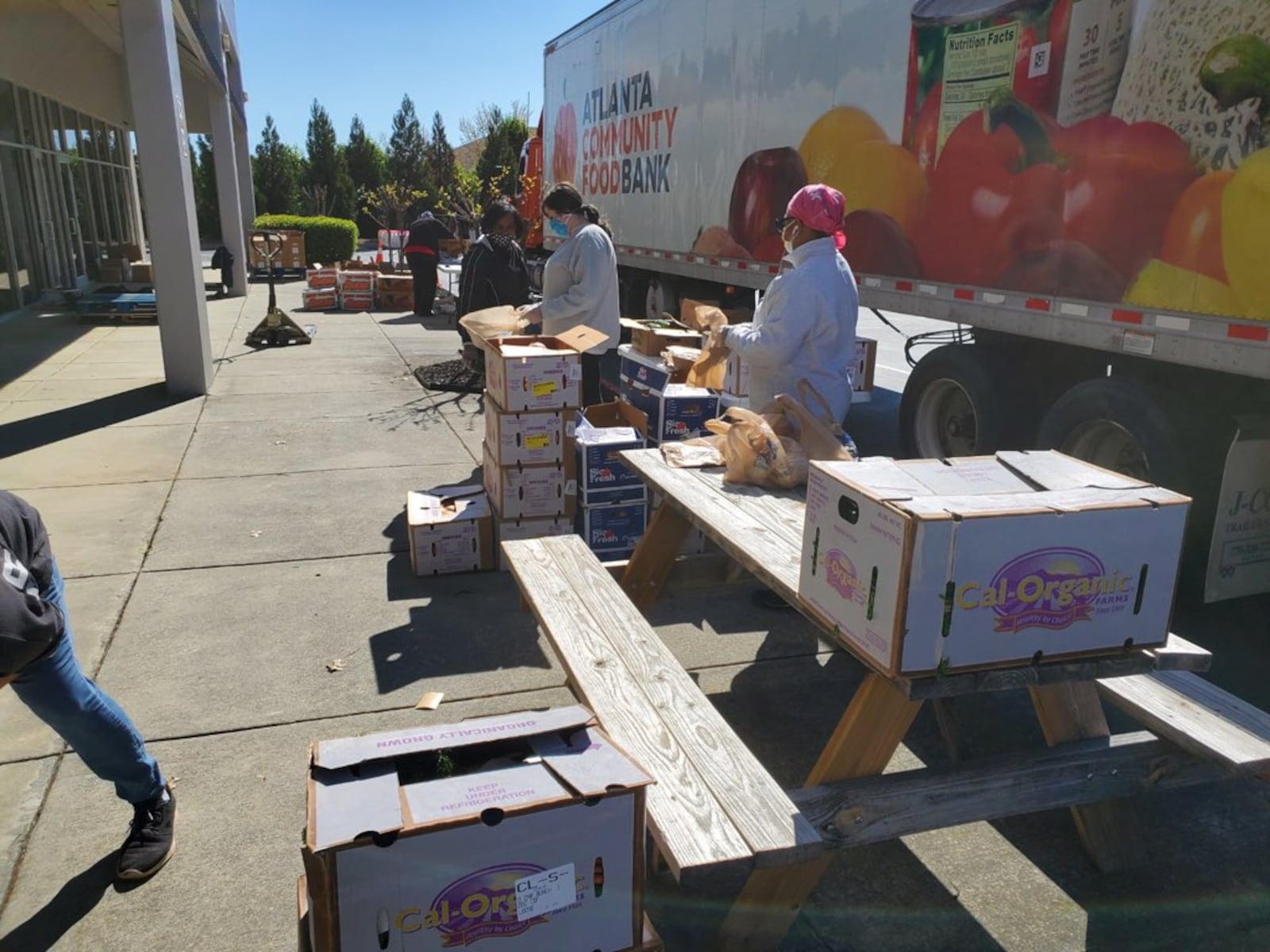 Atlanta Community Food Bank workers distribute food donations. The Food Bank works with over 700 nonprofits to serve more than 755,000 people each year.