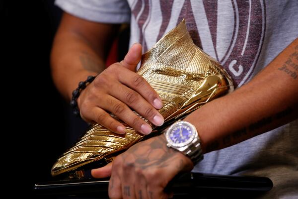 Photos from the press conference as Atlanta United forward Josef Martinez receives his Golden Boot trophy, given to the top MLS scorer each year, at the Atlanta United Training Facility in Marietta, Ga., on Thursday, Nov. 1, 2018. Atlanta Braves outfielder Ender Inciarte, a personal friend of Martinez, made a special guest appearance to give his friend the award. (Casey Sykes for The Atlanta Journal-Constitution)