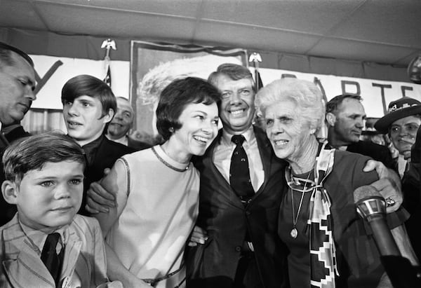 1970: Four years later, Jimmy Carter would be elected governor on his second try. Here, he celebrates on election night with Rosalynn and his mother Miss Lillian. (Billy Downs / AJC Archive at the GSU Library AJCN089-019b)