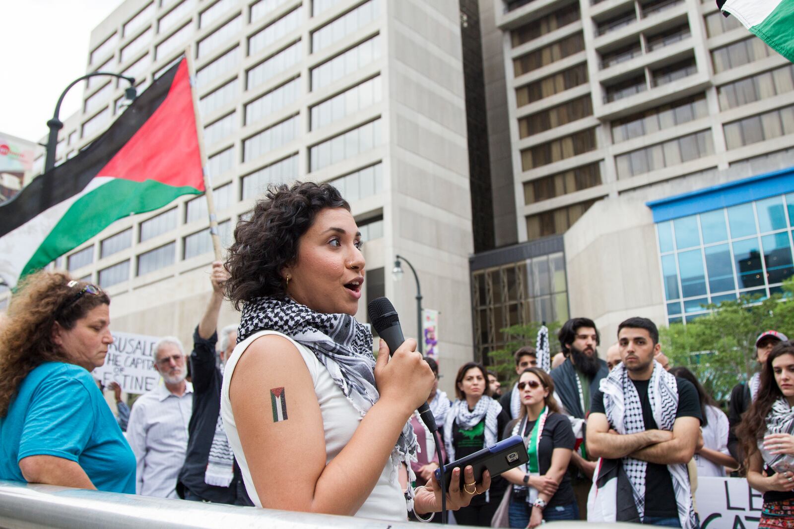 Rozina Gilani, a Jewish Voice for Peace organizer, speaks at the emergency protest for the violence in Gaza in Downtown Atlanta, Georgia, on Tuesday, May 15, 2018. (REANN HUBER/REANN.HUBER@AJC.COM)