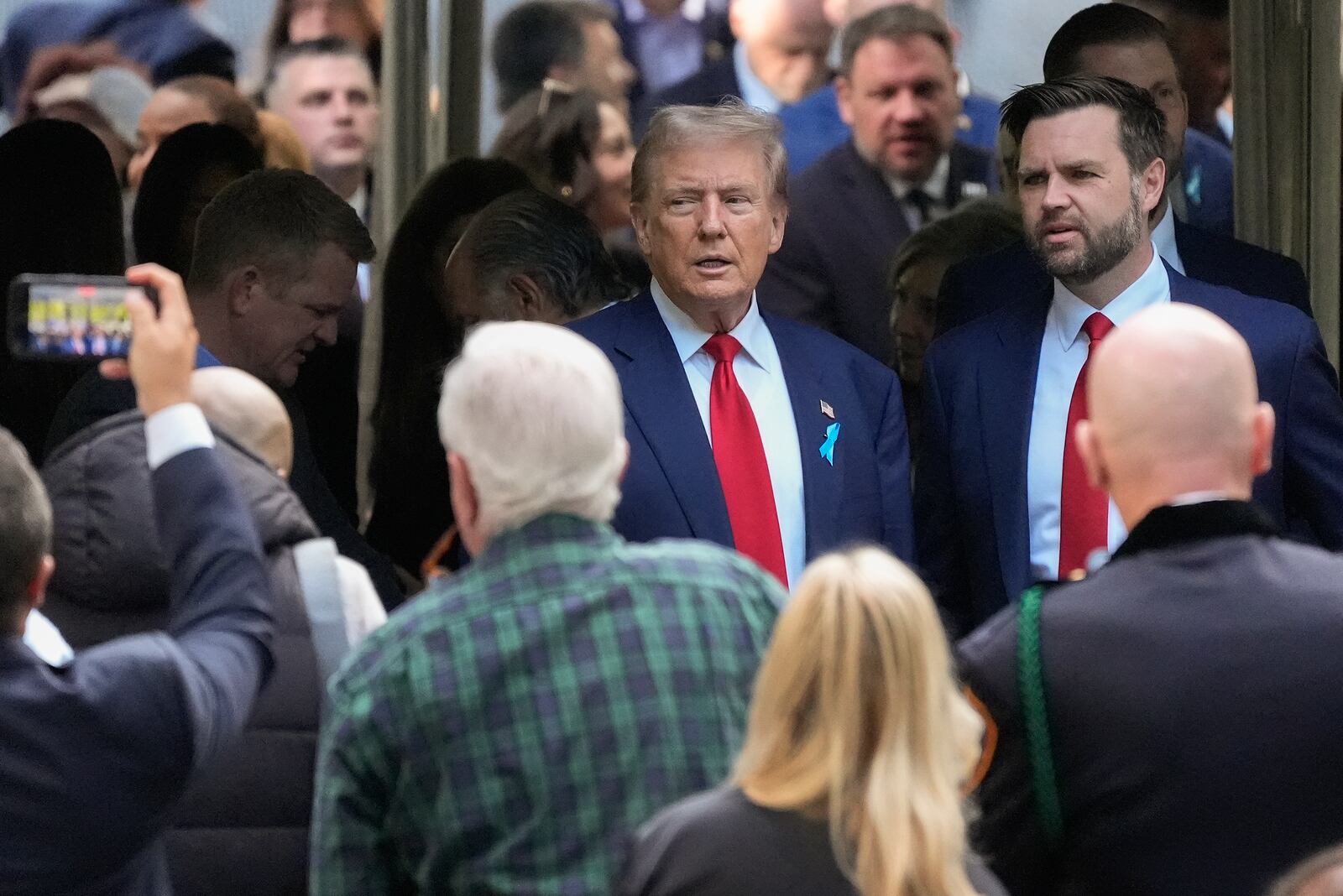 Republican presidential nominee former President Donald Trump and Republican vice presidential nominee Sen. JD Vance, R-Ohio, arrive for the 9/11 Memorial ceremony on the 23rd anniversary of the Sept. 11, 2001 terror attacks, Wednesday, Sept. 11, 2024, in New York. (AP Photo/Pamela Smith)