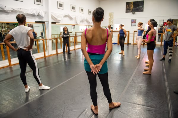 230818 EAST POINT, GA — Karla Tyson, center, and other members of the Ballethnic Dance Company listen as co-founder and co-artistic director Nina Gilreath (second from left) runs through rehearsal notes for the ballet “Sanctity” at the company’s studio in East Point, Ga. on Friday, Aug. 18, 2023, ahead of a performance at the Alliance Theatre at the end of the month. 
Photo by Bita Honarvar for the AJC