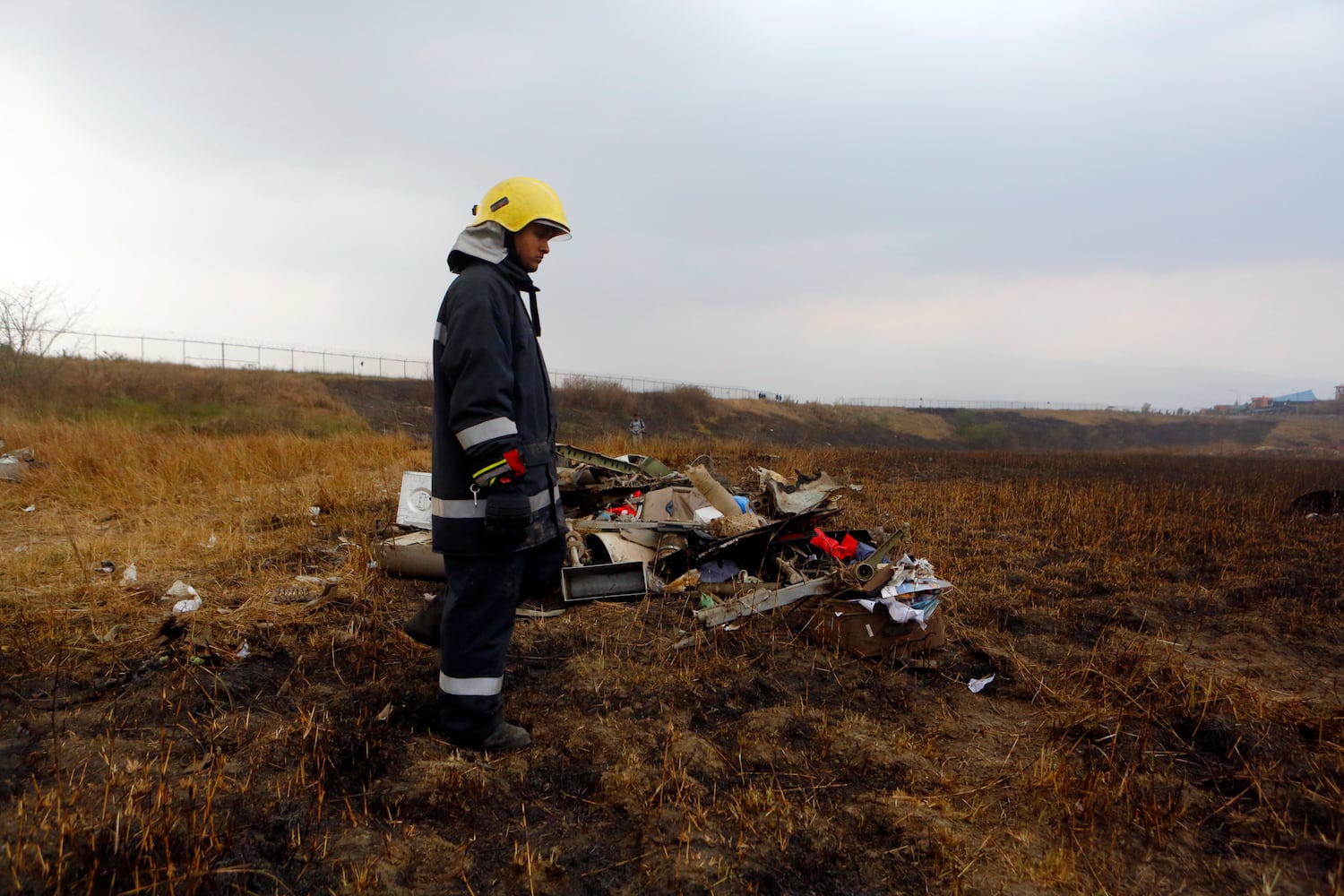 Photos: Kathmandu plane crash kills dozens, Nepal police say