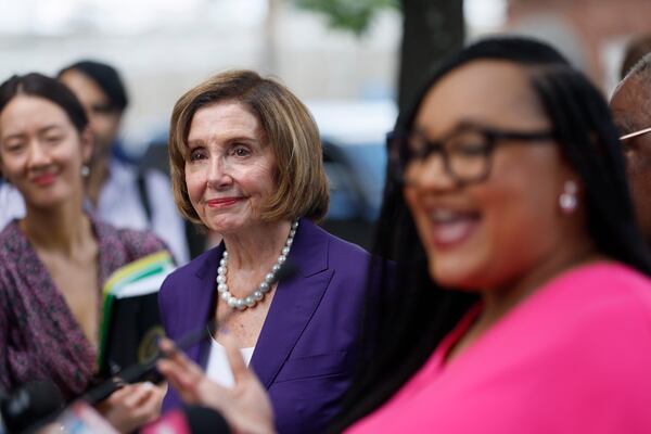 House Speaker Nancy Pelosi, center left, listens as U.S. Rep. Nikema Williams, D-GA, speaks to members of the media as they tour the Sweet Auburn District at Big Bethel AME Church on Thursday, September 1, 2022, in Atlanta. (Jason Getz / Jason.Getz@ajc.com)